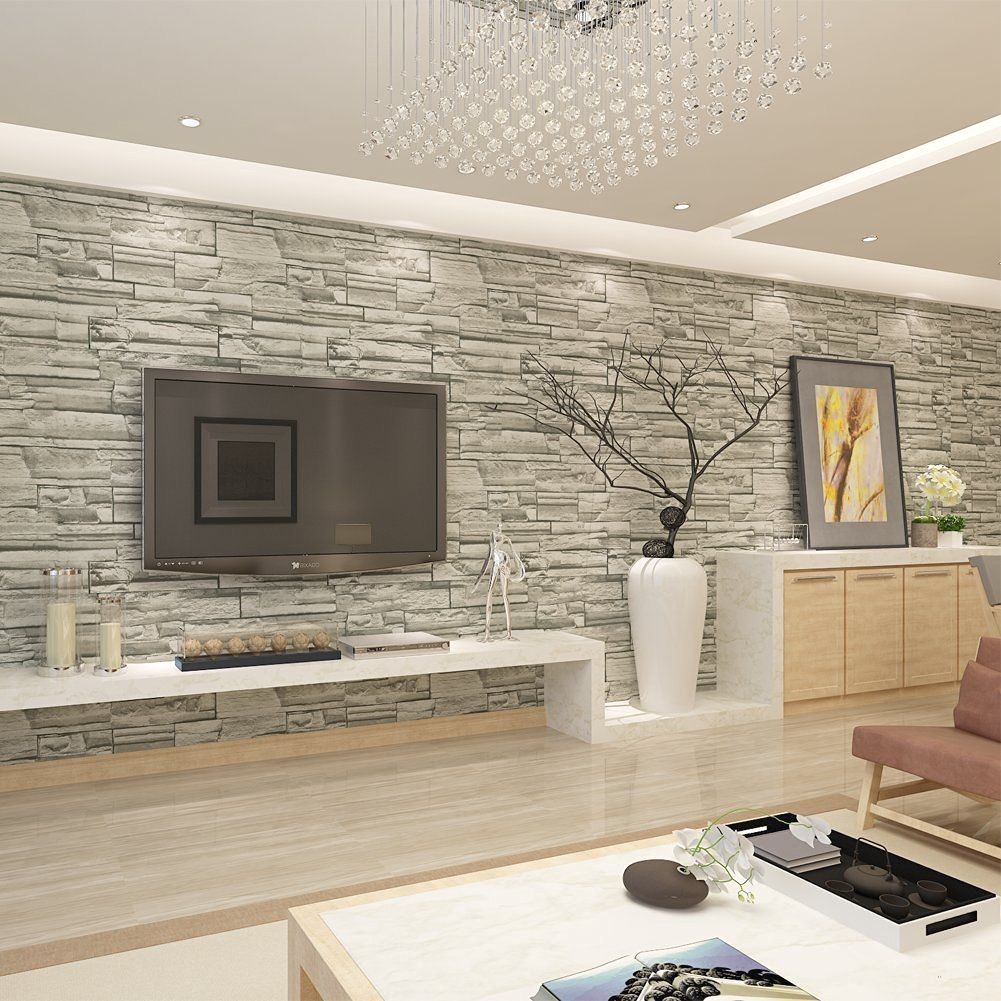 Decoration salon avec mur de pierre
